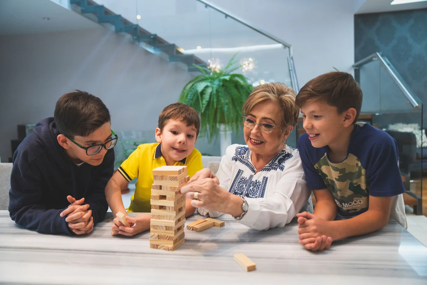 A family playing a game together at a table